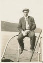 Image of Captain Bob Bartlett sitting on Pipe Rail of Roosevelt